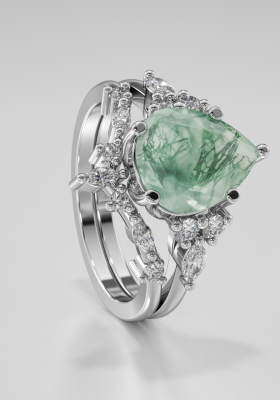 Luxury custom moss agate engagement ring eaturing Lurozzia’s signature floral-inspired basket and modernized classic pavé side band — handcrafted with precision in South Africa, by Lurozzia Jewellers. Lurozzia Signature collections