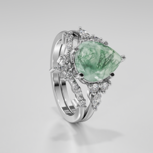 Luxury custom moss agate engagement ring eaturing Lurozzia’s signature floral-inspired basket and modernized classic pavé side band — handcrafted with precision in South Africa, by Lurozzia Jewellers. Lurozzia Signature collections