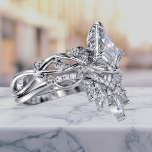 Exquisite marquise kite diamond ring with Lurozzia’s signature vine-woven basket, hidden halo, and leaf-detailed shank, paired with crown styled, intricate woven sideband — an heirloom-quality bespoke piece handcrafted in South Africa by Lurozzia Jewellers. Lurozzia Heritage lines